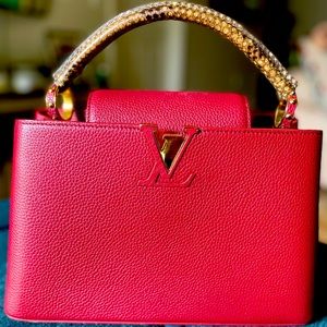 Selling this beautiful Capucines collection Louis Vuitton purse.